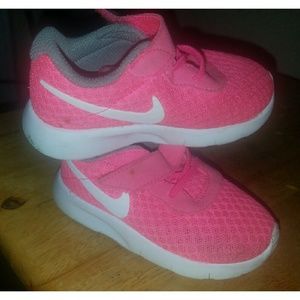 Girls pink and white Nikes 6C