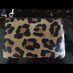 NWT Coach wristlet/change purse.