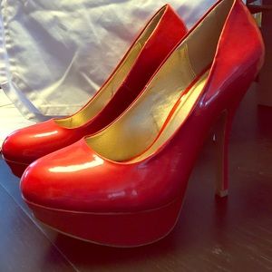 Red pumps never worn. Size 9 Qupid