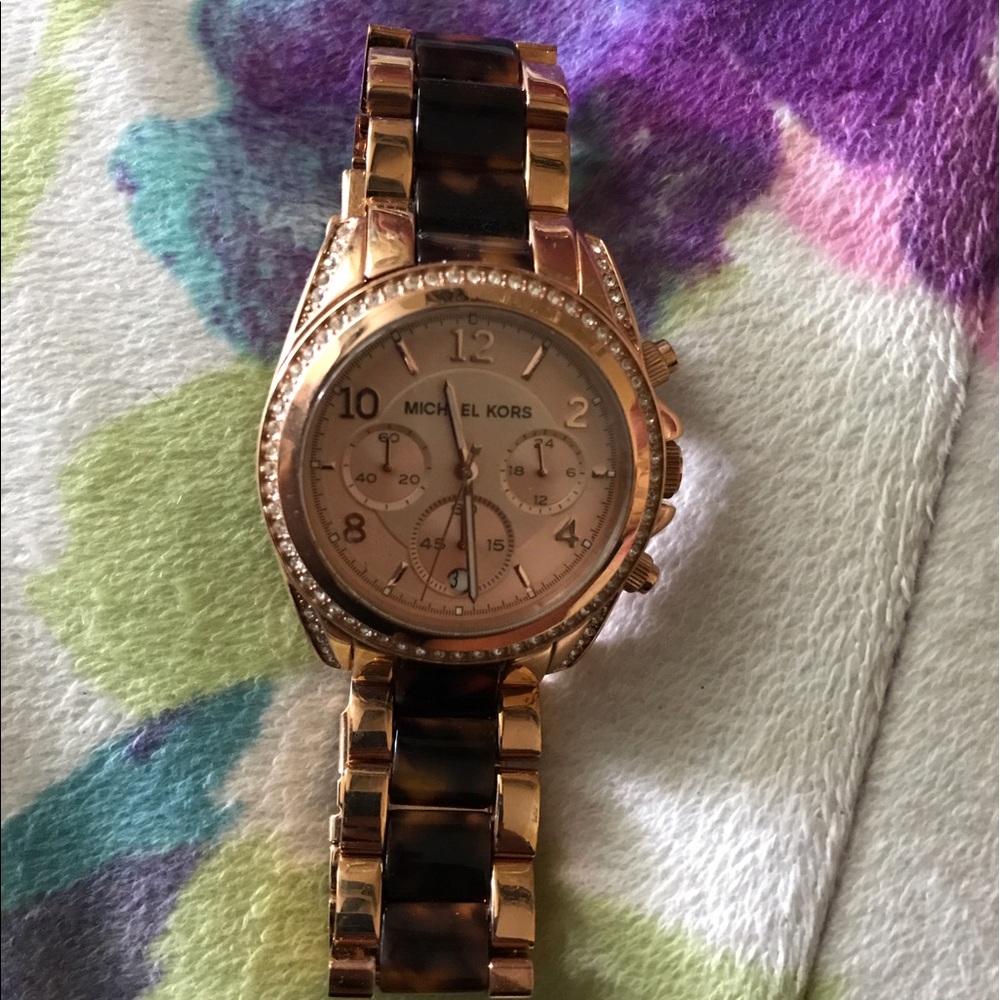 Rose gold and black MK watch