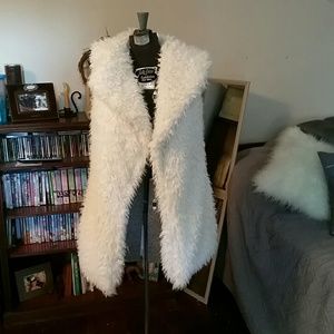 White faux fur vest