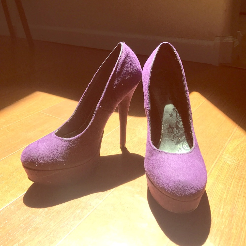 Purple suede pumps.