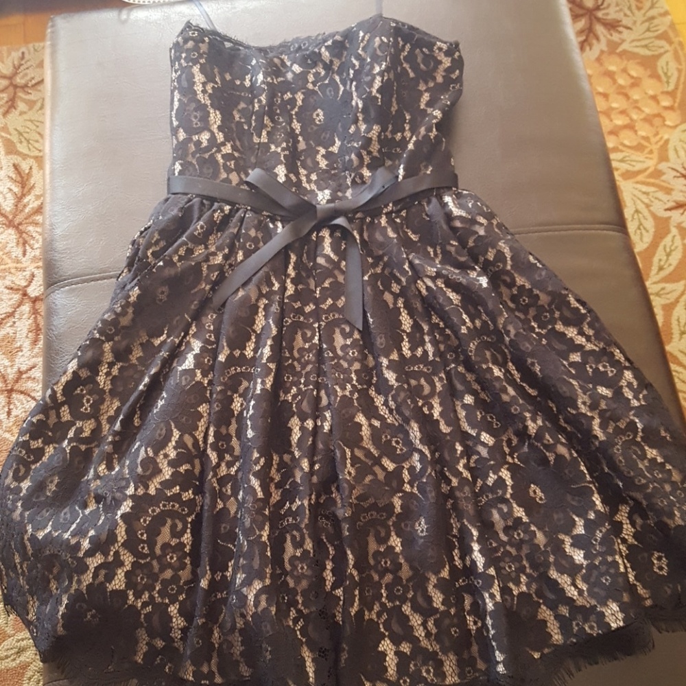 Size 2. Beautiful black & cream lace dress