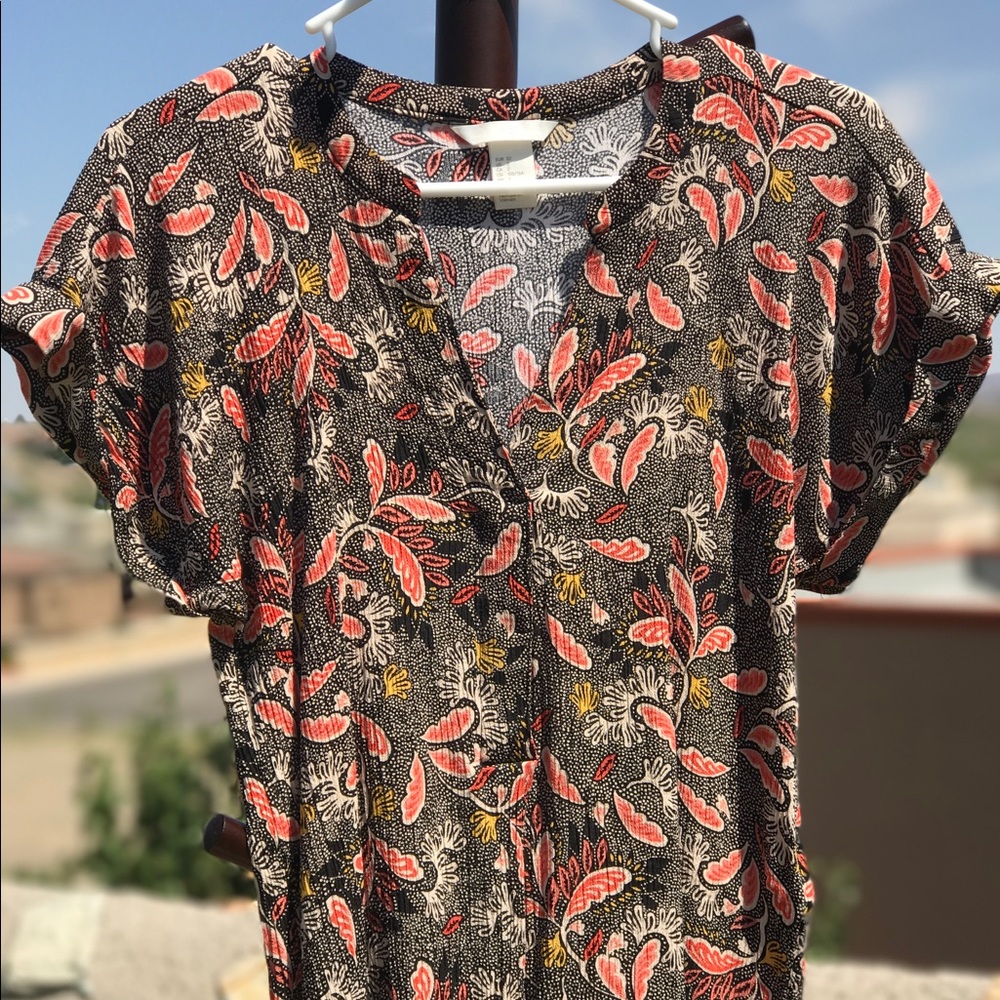 Modern, multi-patterned blouse