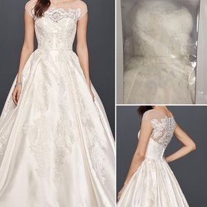 Petit cap sleeve Oleg Cassini wedding dress