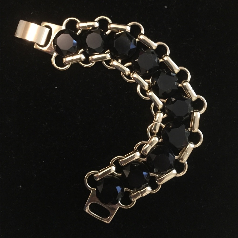 Goldtone and black bracelet