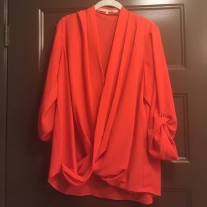 Bright red blouse