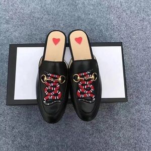 Black Slides with Snake sz40. Fits like 8.5