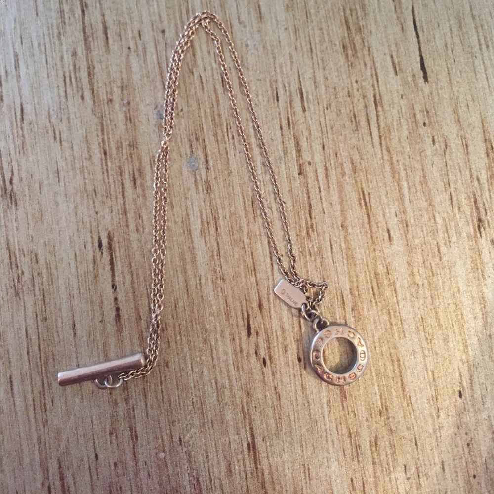 Rose gold coach brand bracelet