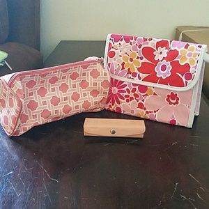 Two clinique makeup bags and lipstick case