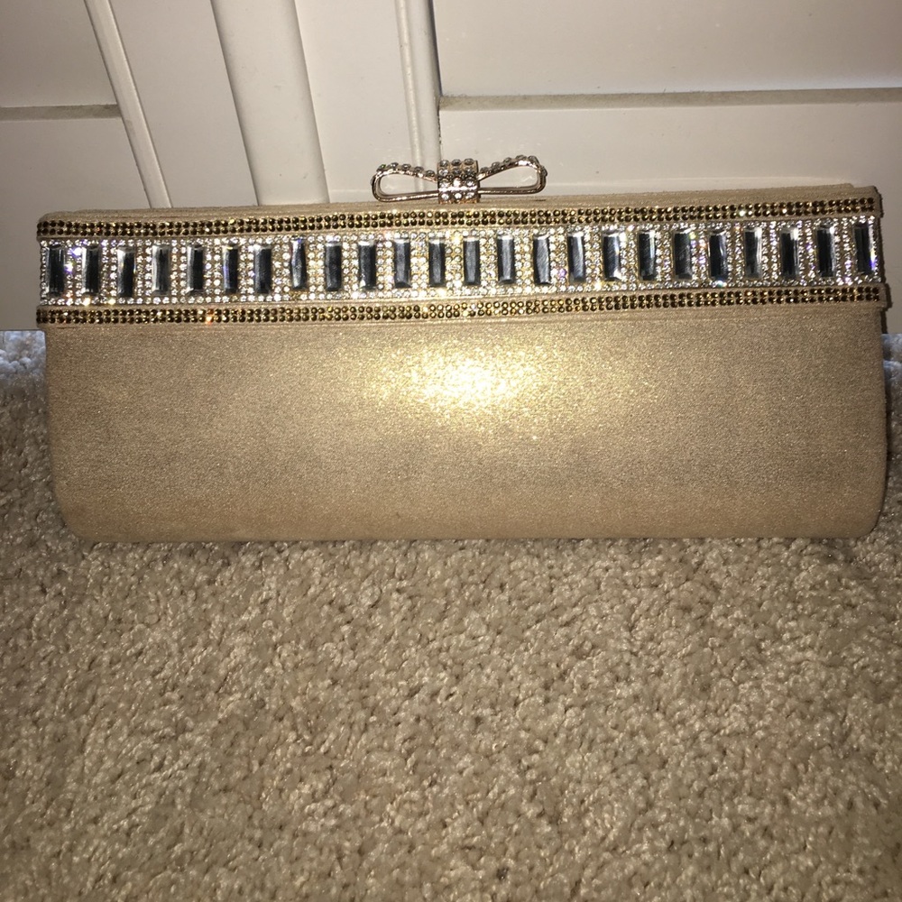 BRAND NEW gold clutch! Perfect condition!!