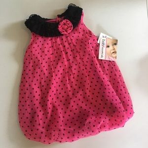 NWT girls romper. Size 12 mo