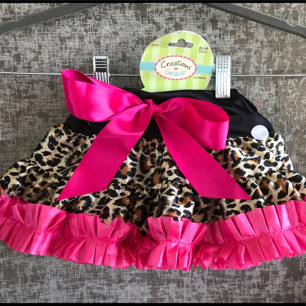 TuTu. White dot in pics are the tag