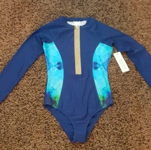 Roxy navy long sleeve swim suit with thumbholes.