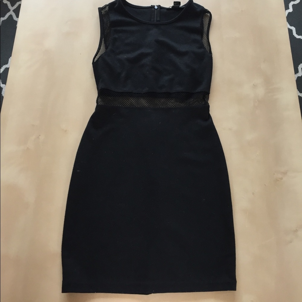 Cute black mini dress with details