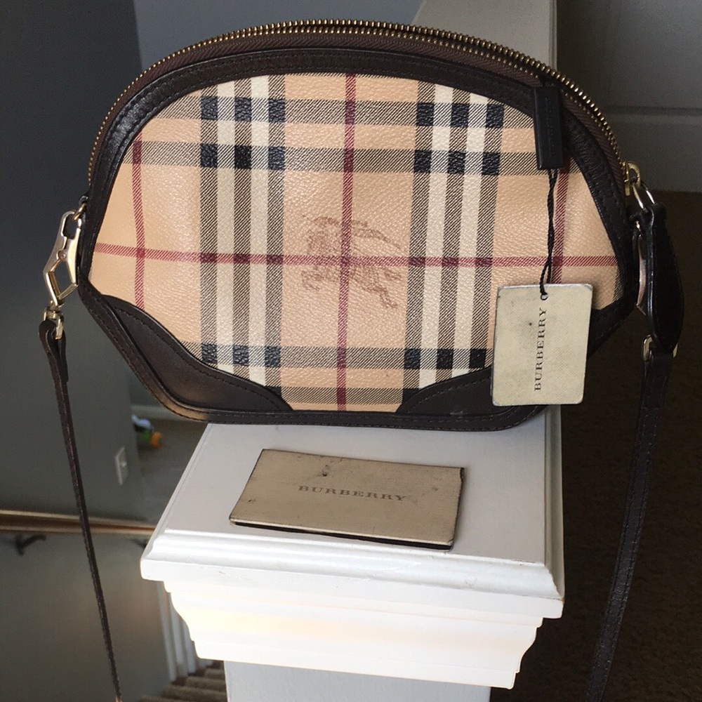 Aouthantic Burberry sling bag . Used condition .