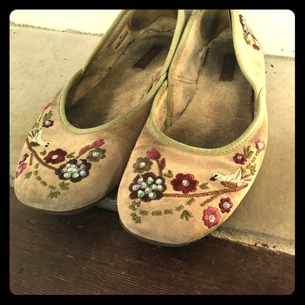 Embroidered suede flats by Aldo