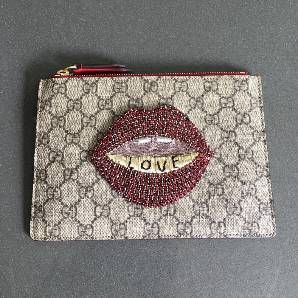 Gucci Merveilles GG mouth embellished pouch