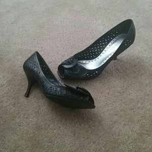 BCBGirls black laser cut heel