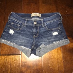 Distressed dark wash denim jean shorts