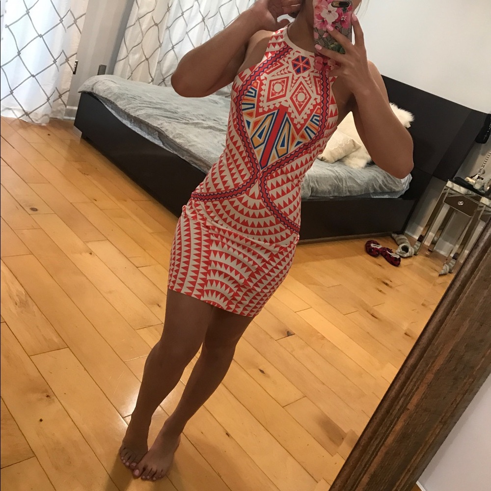 Trendy patterned form fitting halter dress