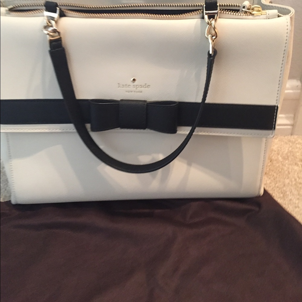 Kate Spade satchel in white with black bow