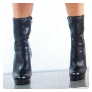 Kelsi Dagger "Carlotta" mid calf boots.