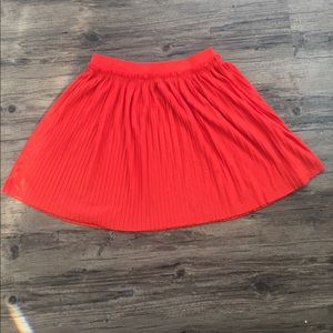 Orange Pleated Mini Skirt