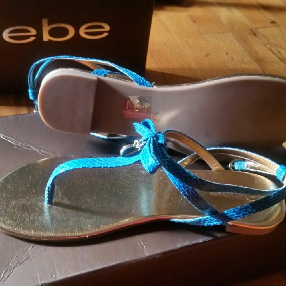 Never worn bebe heart sandals.
