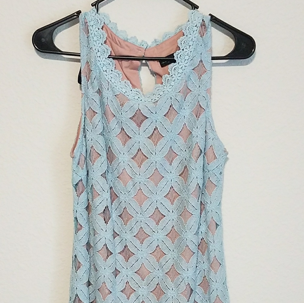 Powder blue sleeveless dress. New. Size large.