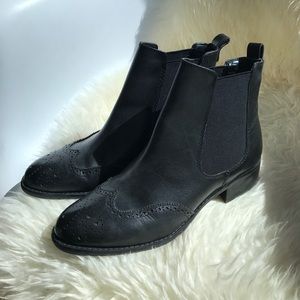 Franco Sarto leather boots with a wingtip design