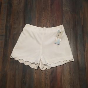 Scalloped white shorts