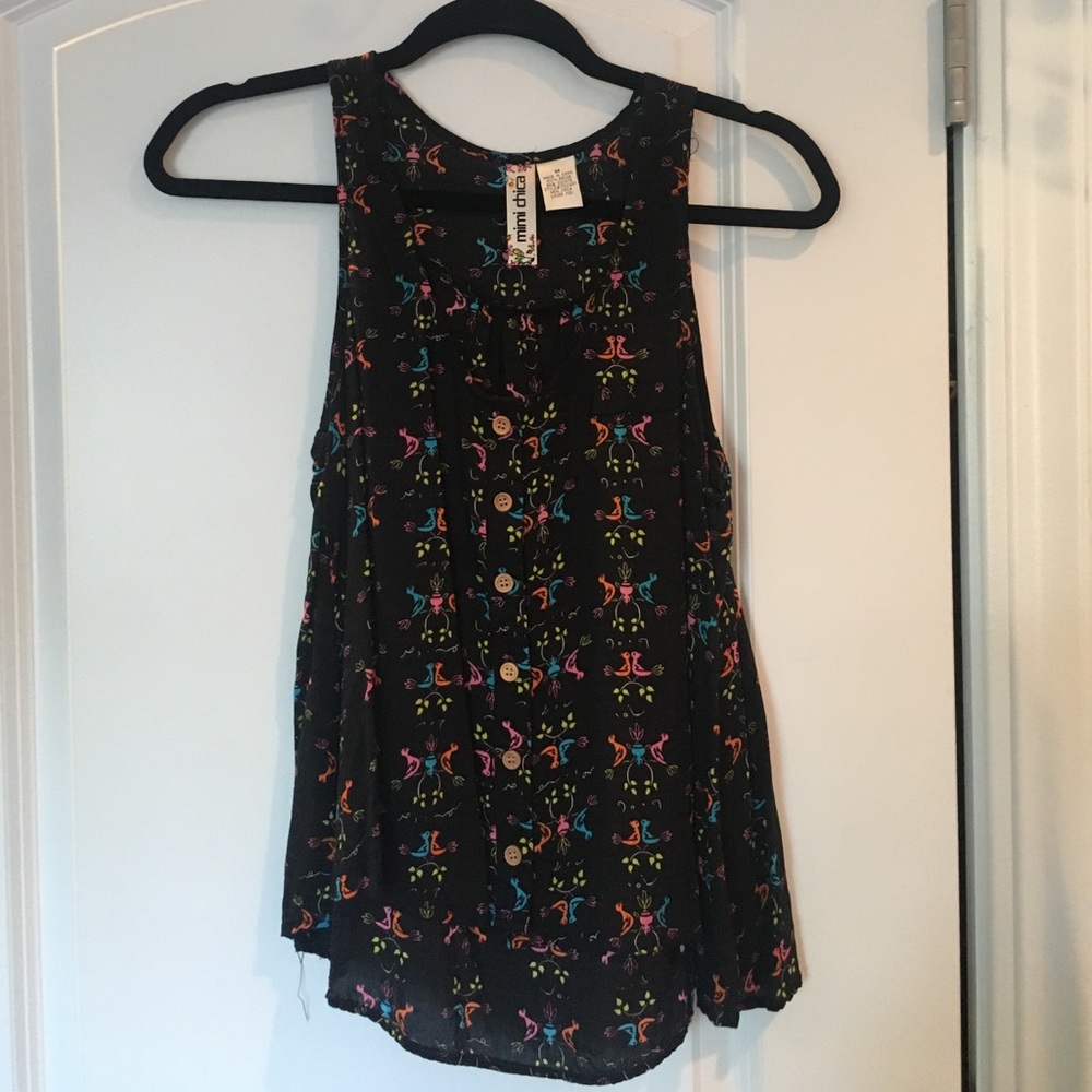 Black swing tank top with colorful bird pattern