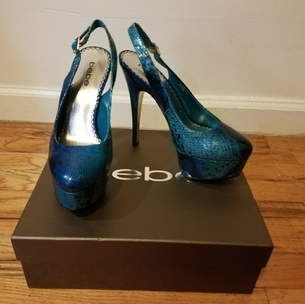 bebe betty snake platform pumps.