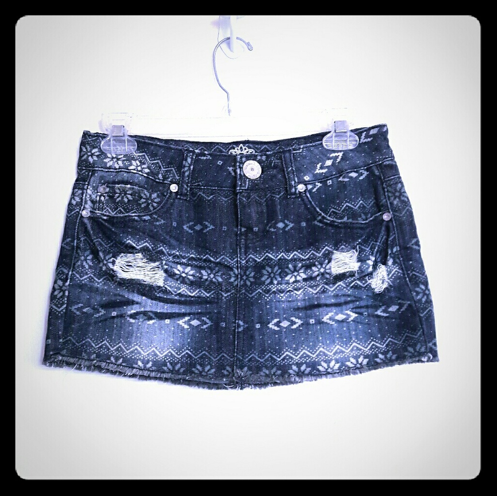 Ripped denim mini skirt