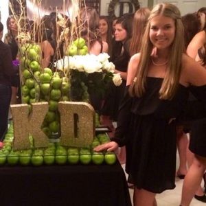 Black off the shoulder dress with long sleeves