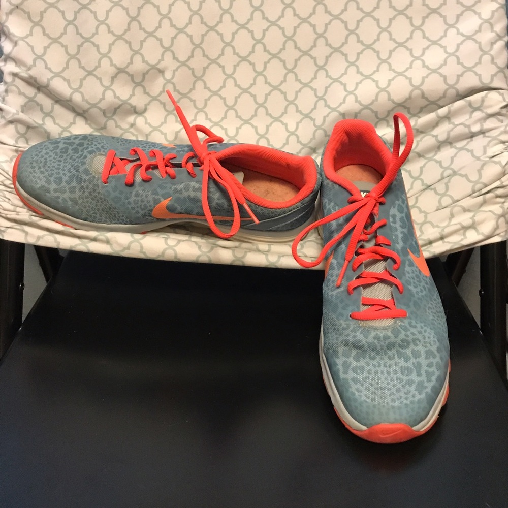 Light blue cheetah/Coral Nike running shoes