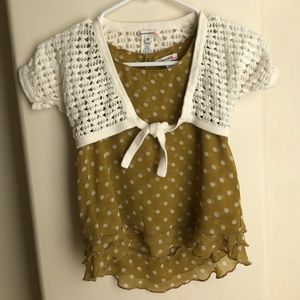 Sleeveless blouse and a crochet sweater