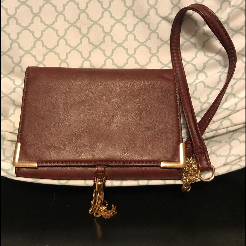 deep burgundy Buckle clutch with Crossbody strap