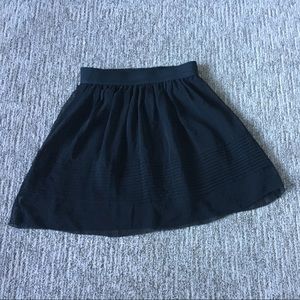 Sheer black mini skirt