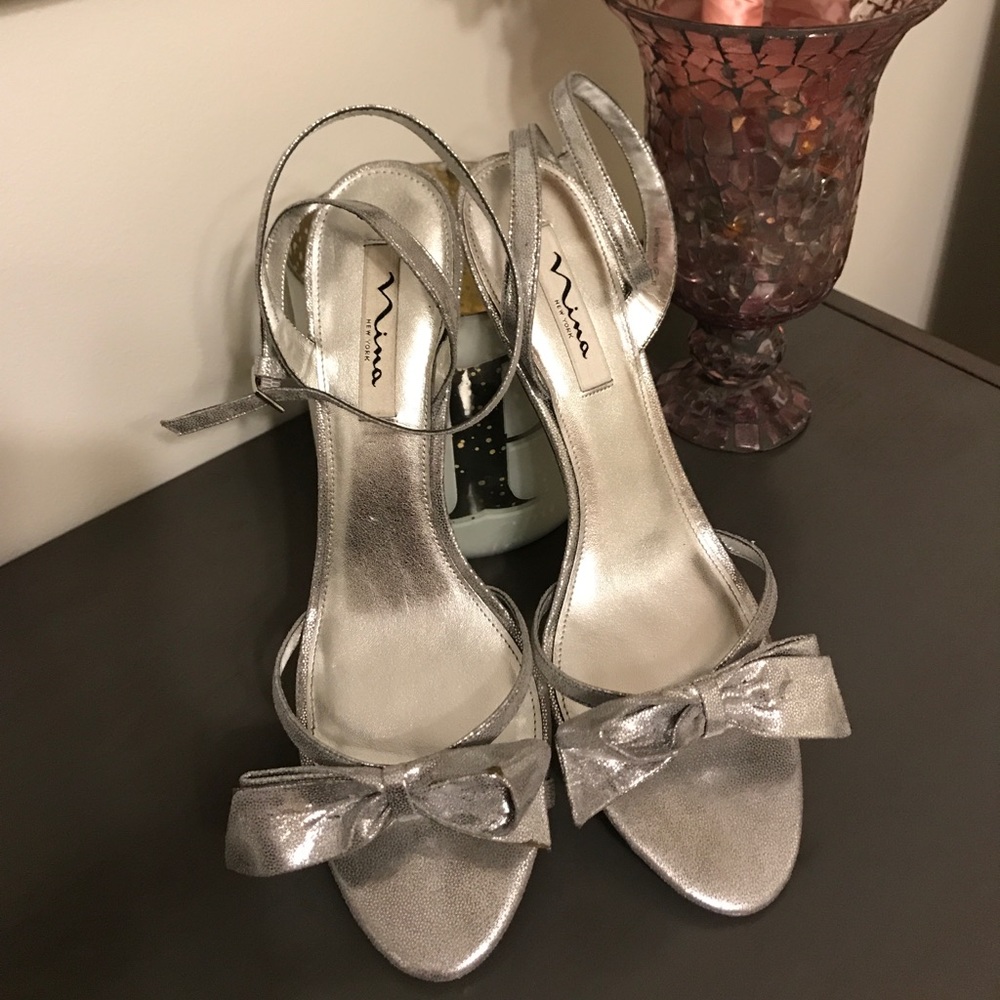Silver ankle strap shoes by Nina