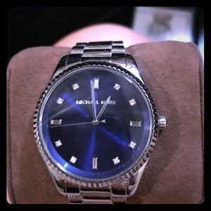 Men's Michael Kors silver watch w blue face.