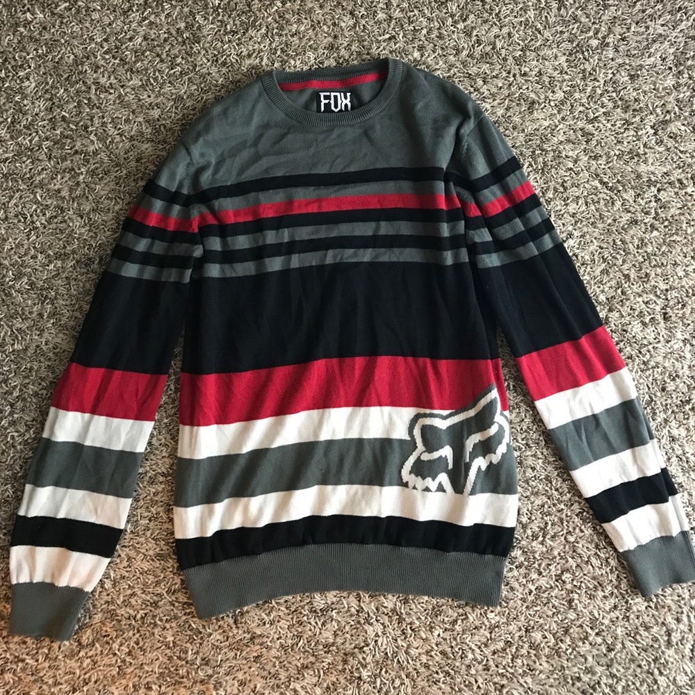 Gray, Black, White, and Red long sleeve sweater.