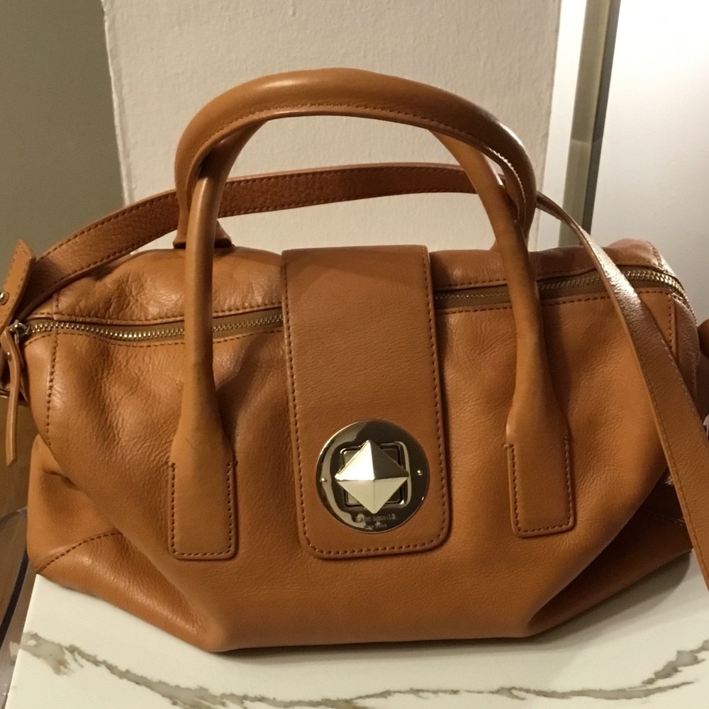 Kate spade cross body satchel with handle.