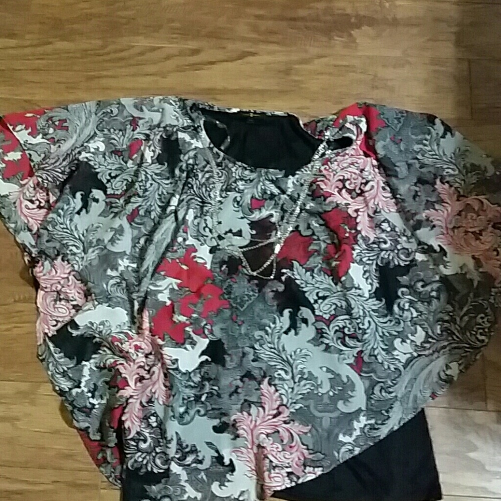 Womens Top with tank top attached.