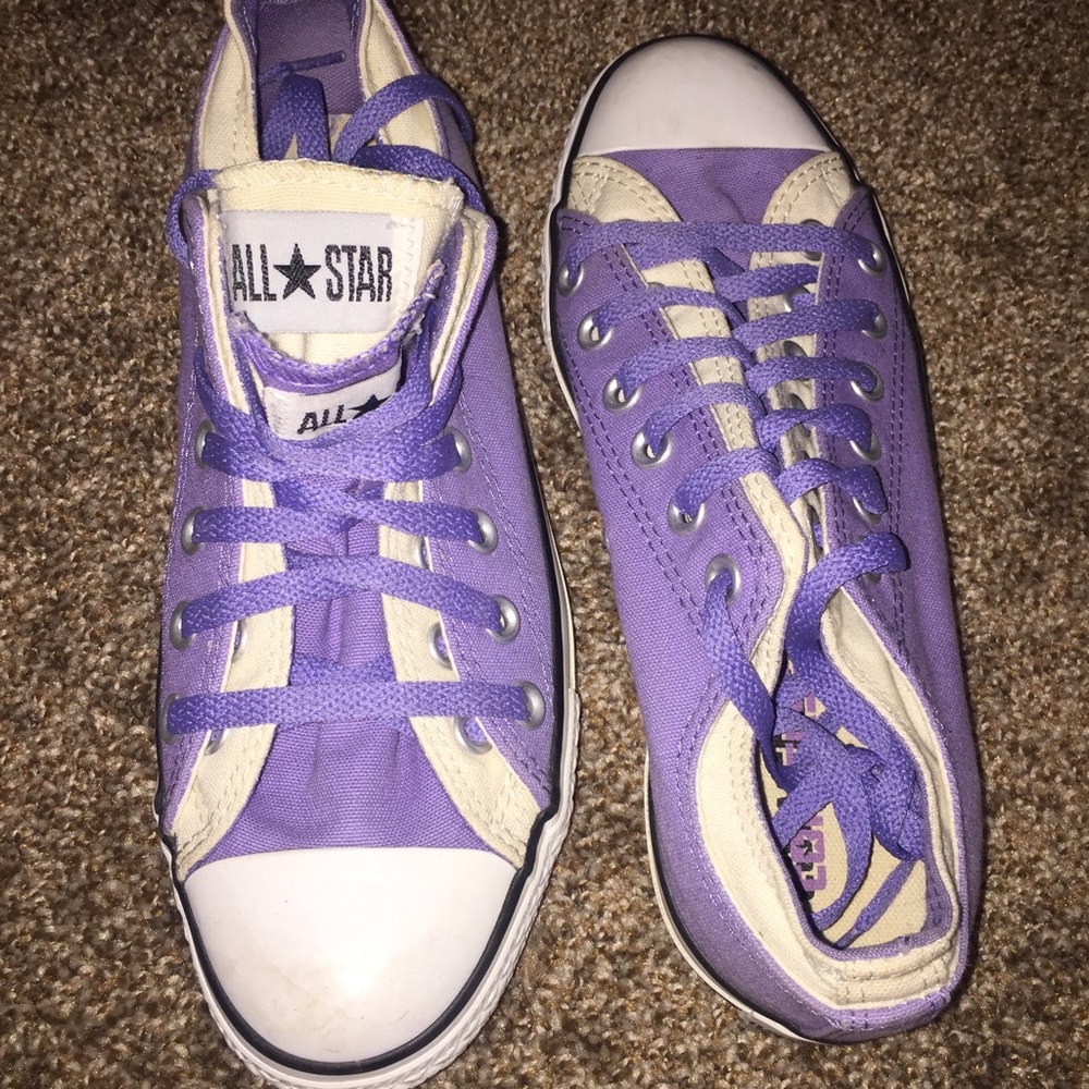 Purple and white Converse sneakers