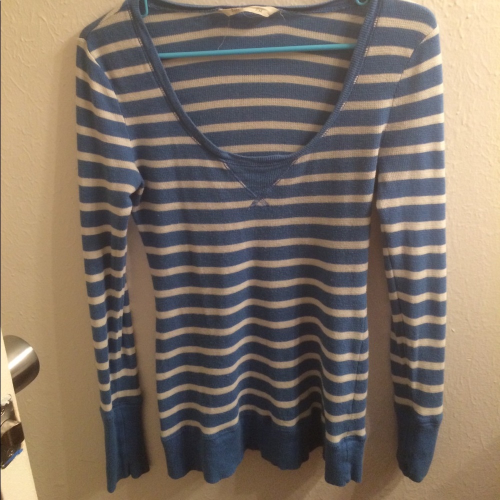 Striped knit long sleeved shirt.