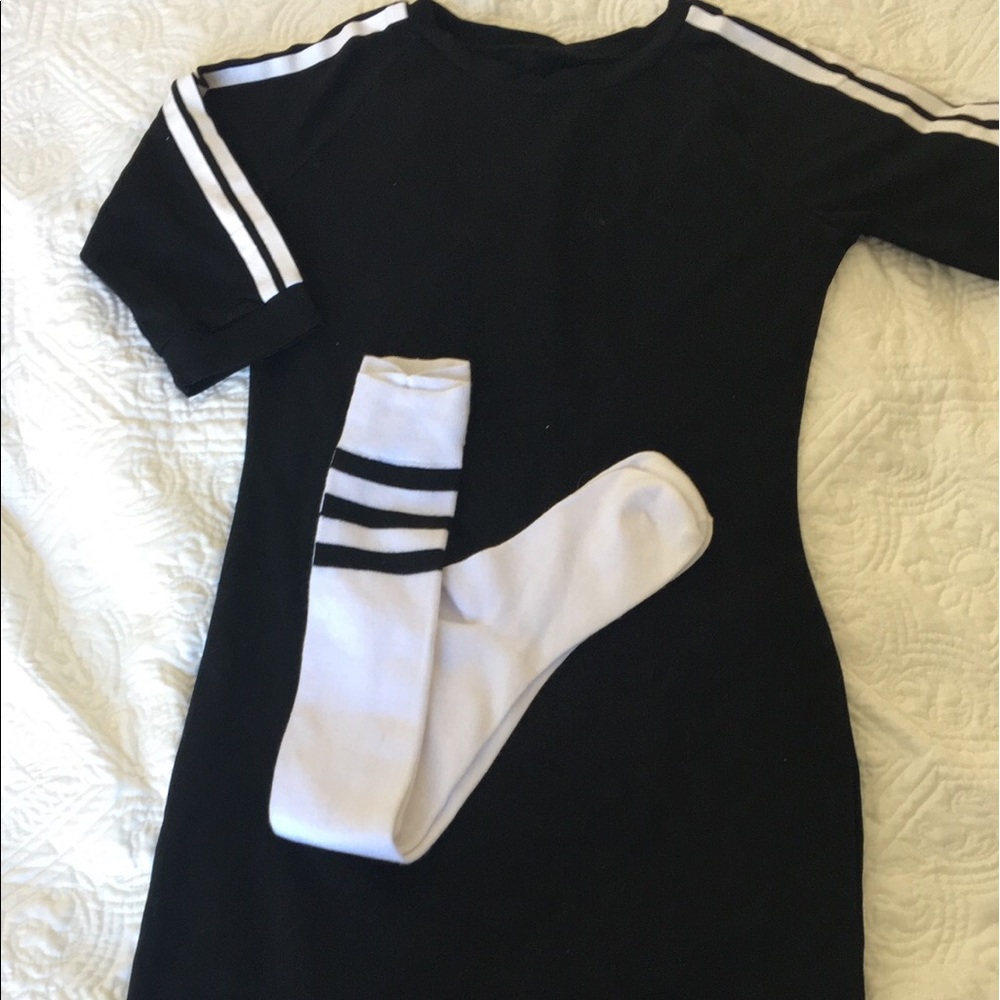 Black and white stripe athletic dress .