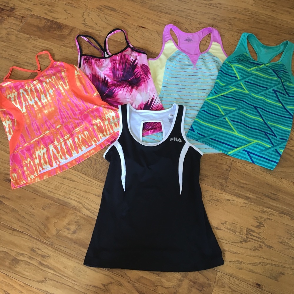 Lot of two athletic yoga tanks. Sold 3.  Med & lg