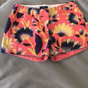 Bermuda style red flower shorts